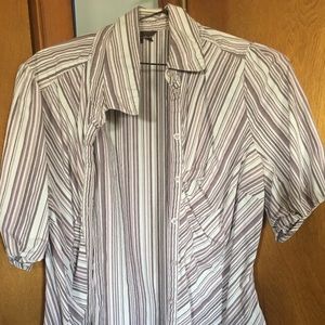 Woman’s preowned button up shirt